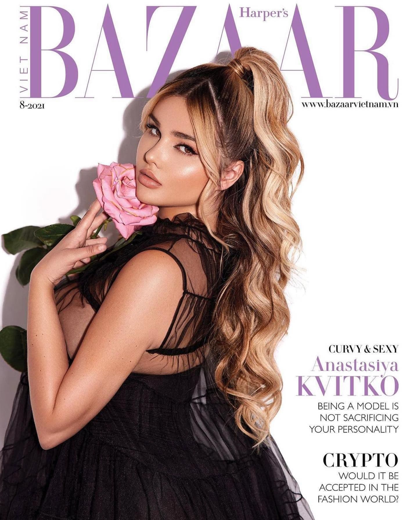 Magazine cover featuring a model with a high ponytail, blonde highlights and a black dress, holding a pink rose.
